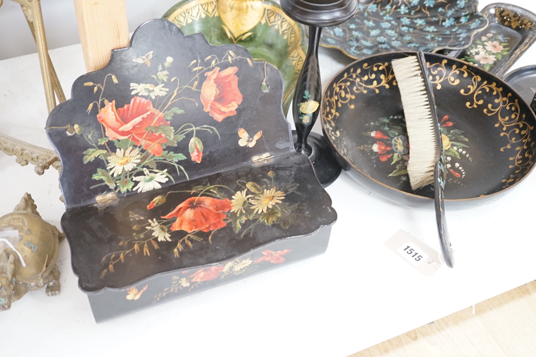 A Victorian papier mache candle box, two crumb scoops and four other items